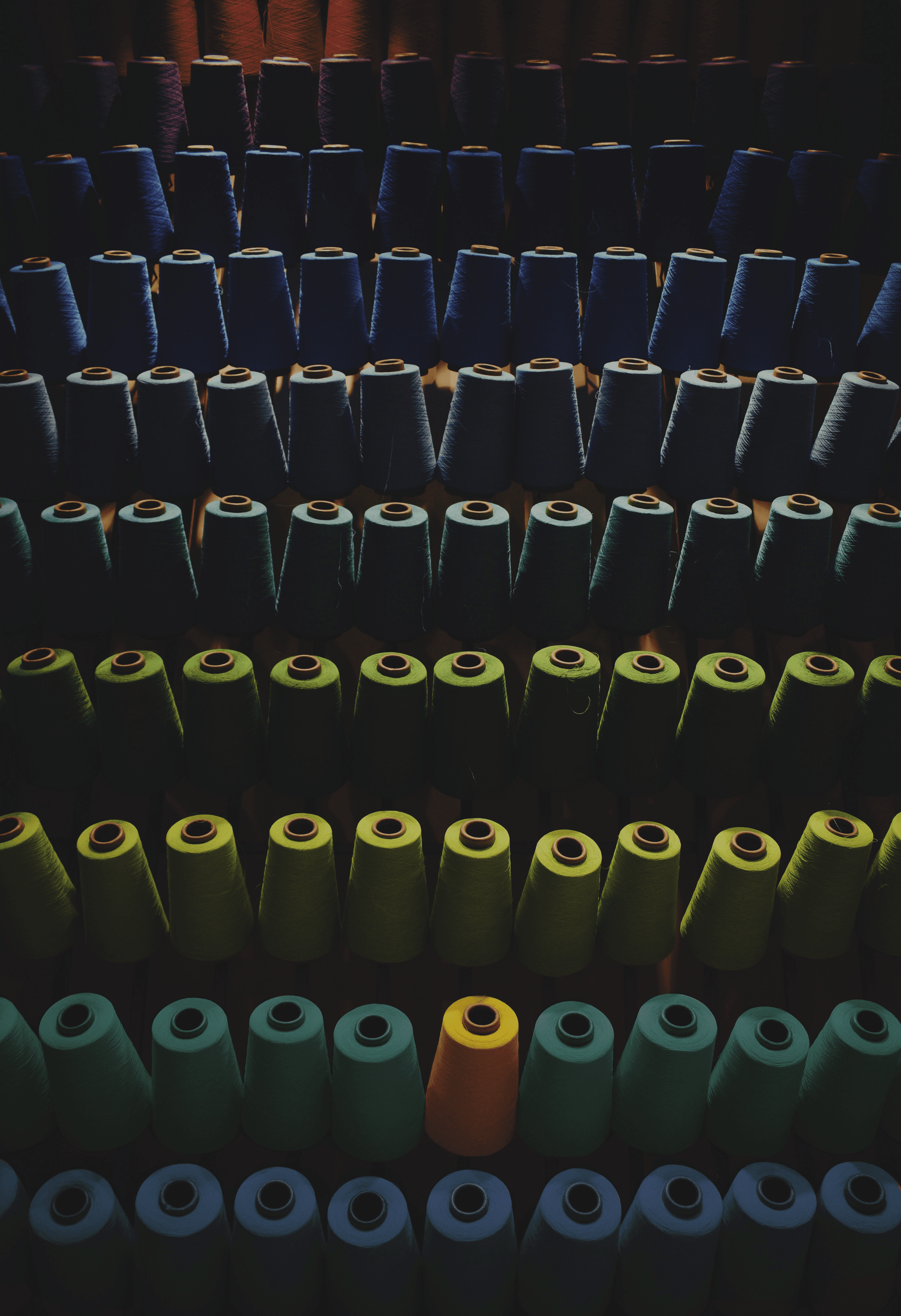 various threads arranged by color